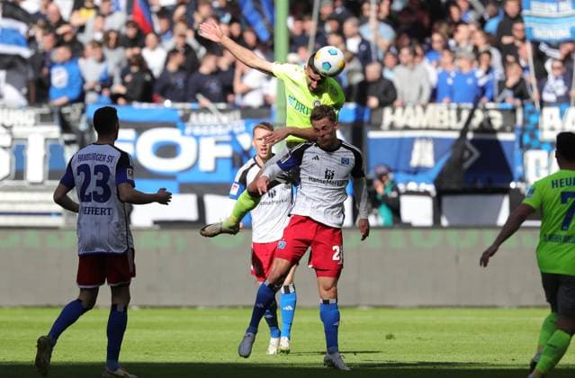 GER, 2 Liga, Hamburger SV vs SV Wehen Wiesbaden 17 03 2024, Volksparkstadion, Hamburg, GER, 2 Liga, Hamburger SV vs SV Wehen Wiesbaden in the picture picture shows duel header header duel between Ivan Prtajin SV Wehen Wiesbaden 18 and Miro Muheim Hamburger SV 28 nordphotoxGmbHx xTauchnitz nph00059