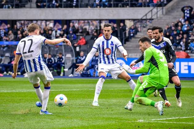 Soccer 2 Bundesliga, Hertha BSC FC Schalke 04 17 03 2024, xdanx, Soccer 2 Bundesliga, Hertha BSC FC Schalke 04, v l Marten Winkler Hertha BSC 22 ,Marius Mueller FC Schalke 04 32 ,Haris Tabakovic Hertha BSC 25 ,Goal to 3 2 DFL DFB REGULATIONS PROHIBIT ANY USE OF PHOTOGRAPHS as IMAGE SEQUENCES and or QUASI VIDEO Photo Daniel Lakomski Mix1 Berlin Olympiastadion Berlin Berlin Germany EN Copyright: xDanielxLakomskix