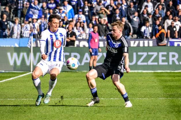 Soccer 2 Bundesliga, Hertha BSC FC Schalke 04 17 03 2024, xdanx, Soccer 2 Bundesliga, Hertha BSC FC Schalke 04, v l Fabian Reese Hertha BSC 11 ,Andreas Bouchalakis Hertha BSC 5 ,Zweikampf, Duell, Kampf, tackle DFL DFB REGULATIONS PROHIBIT ANY USE OF PHOTOGRAPHS as IMAGE SEQUENCES and or QUASI VIDEO Foto Daniel Lakomski Mix1 Berlin Olympiastadion Berlin Berlin Berlin Deutschland DE Copyright: xDanielxLakomskix