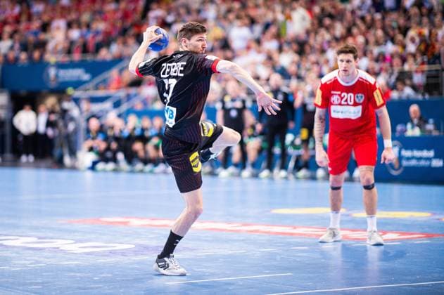 17 03 2024 Handball, mens international match, Olympic qualification in Hanover, Austria Germany Lukas Zerbe Germany taking a seven-meter penalty