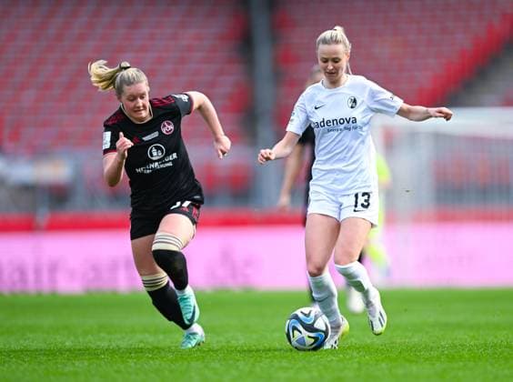 Germany, Nuremberg, 17 03 2024, Max Morlock Stadion, 1 FC Nuremberg vs SC Freiburg Frauen Bundesliga, Judith Steinert SC Freiburg and Selma Sol Magnusdottir 1 FC Nuremberg battle for the ball Nuremberg Max Morlock Stadion Bavaria Germany eu-images-738