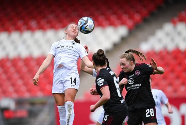 Germany, Nuremberg, 17 03 2024, Max Morlock Stadion, 1 FC Nuremberg vs SC Freiburg Frauen Bundesliga, Milla Punsar SC Freiburg and Madeleine Steck 1 FC Nuremberg battle for the ball Nuremberg Max Morlock Stadion Bavaria Germany eu-images-738