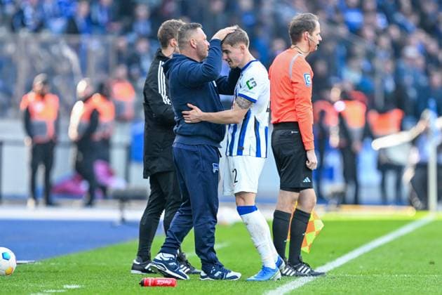 2 Bundesliga Hertha BSC Berlin FC Schalke 04 on 17 03 2024 at the Olympiastadion in Berlin Coach Pal Dardai Hertha BSC Berlin kisses Marten Winkler Hertha BSC Berlin on the forehead MT