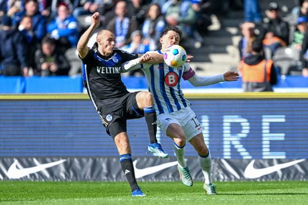 2 Bundesliga Hertha BSC Berlin FC Schalke 04 on 17 03 2024 at Olympiastadion in Berlin Henning Matriciani FC Schalke 04 in a tackle against Fabian Reese Hertha BSC Berlin MT