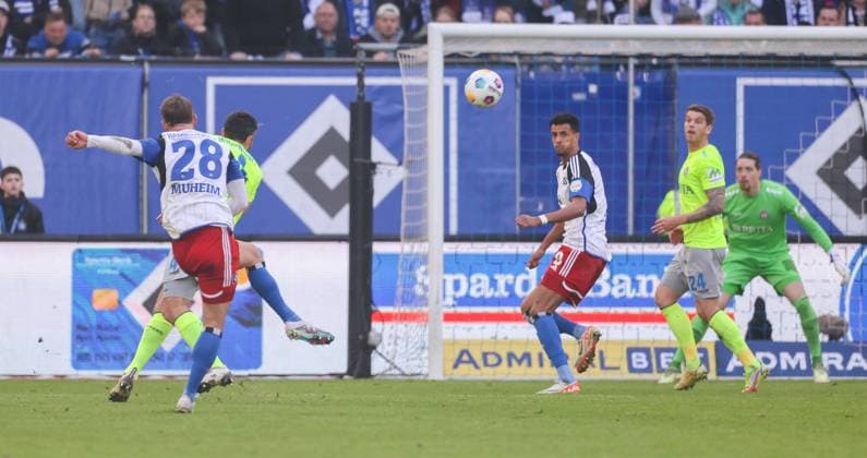 Soccer 2 BL Hamburger SV SV Wehen Wiesbaden 17 03 24, 1 0 by Miro Muheim HSV , Sascha Mockenhaupt SVWW deflects and gives the ball a crooked trajectory,