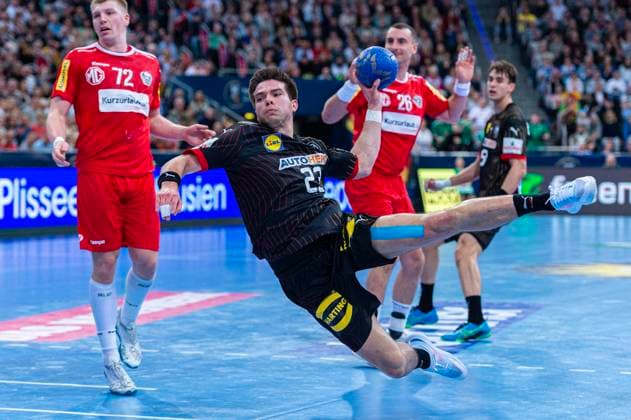 Renars Uscins Germany , Nr 23 L R , Germany black against Austria red 3 Matchday of the 2024 IHF s Olympic Qualification Tournament 17 03 2024, ZAG Arena Hannover, GER , Copyright: xJanxGuentherx xTSVxHannover-Burgdorfx