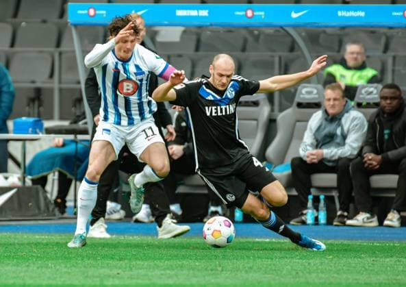 Soccer 2 Bundesliga, Hertha BSC FC Schalke 04 17 03 2024, xdanx, Soccer 2 Bundesliga, Hertha BSC FC Schalke 04, v l Fabian Reese Hertha BSC 11 ,Henning Matriciani FC Schalke 04 41 ,Zweikampf, Duell, Kampf, tackle DFL DFB REGULATIONS PROHIBIT ANY USE OF PHOTOGRAPHS as IMAGE SEQUENCES and or QUASI VIDEO Foto Daniel Lakomski Mix1 Berlin Olympiastadion Berlin Berlin Deutschland DE Copyright: xDanielxLakomskix