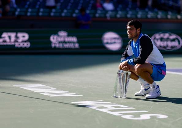 March 17, 2024 Carlos Alcaraz of Spain poses with the winner s trophy after defeating Daniil Medvedev in the Men s Final during the BNP Paribas Open at Indian Wells Tennis Garden in Indian Wells, CA. CSM Indian Wells United States of America - ZUMAc04_ 20240317_zma_c04_211 Copyright: xCharlesxBausx