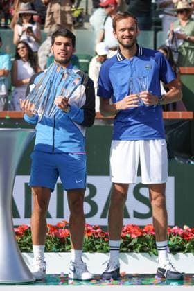 INDIAN WELLS, CA - MARCH 17: Carlos Alcaraz (ESP) and Daniil Medvedev pose following the menÕs singles final of the BNP Paribas Open on March 17, 2024 at Indian Wells Tennis Garden in Indian Wells, CA. (Photo by George Walker Icon Sportswire) TENNIS: MAR 17 BNP Paribas Open EDITORIAL USE ONLY Icon240317066