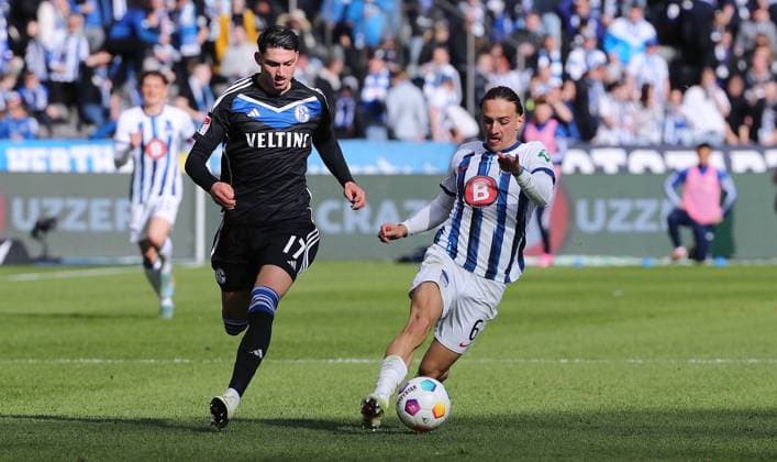 Yusuf Kabadayi, Michal Karbownik duel match scene Action Sport Football Soccer DFL 2 Bundesliga Men 26 Matchday Season 2023 2024 17 03 2024 Hertha BSC Berlin vs FC Schalke 04 DFL regulations prohibit any use of photographs as image sequences and or quasi video