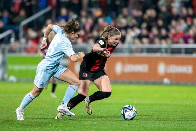 Duel between Martyna Wiankowska 1 FC Koeln, 26 and Karolina Lea Vilhjalmsdottir Bayer 04 Leverkusen, 18 Soccer Google Pixel Womens Bundesliga, Season 2023 2024, Matchday 16, Bayer 04 Leverkusen 1 FC Koeln on 18 03 2024 at Ulrich Haberland Stadium in Leverkusen Important notice According to the regulations of the DFL German Football League or the DFB German Football Association it is prohibited, to utilize or have utilized photographs taken in the stadium and or of the match in the form of sequential images and or video-like photo series Foto Kirchner Media TH Copyright: xKirchner-Media THx
