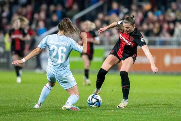 Duel between Martyna Wiankowska 1 FC Koeln, 26 and Karolina Lea Vilhjalmsdottir Bayer 04 Leverkusen, 18 Soccer Google Pixel Womens Bundesliga, Season 2023 2024, Matchday 16, Bayer 04 Leverkusen 1 FC Koeln on 18 03 2024 at Ulrich Haberland Stadium in Leverkusen Important notice According to the regulations of the DFL German Football League or the DFB German Football Association it is prohibited, to utilize or have utilized photographs taken in the stadium and or of the match in the form of sequential images and or video-like photo series Foto Kirchner Media TH Copyright: xKirchner-Media THx