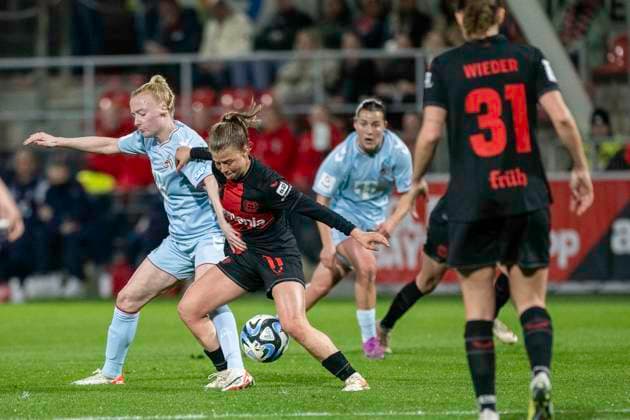 Duel between Anna Gerhardt 1 FC Koeln, 21 and Kristin Koegel Bayer 04 Leverkusen, 11 Soccer Google Pixel Womens Bundesliga, Season 2023 2024, Matchday 16, Bayer 04 Leverkusen 1 FC Koeln on 18 03 2024 at Ulrich Haberland Stadium in Leverkusen Important notice According to the regulations of the DFL German Football League and the DFB German Football Association it is prohibited, to utilize or have utilized photographs taken in the stadium and or of the match in the form of sequential images and or video-like photo series Foto Kirchner Media TH Copyright: xKirchner-Media THx