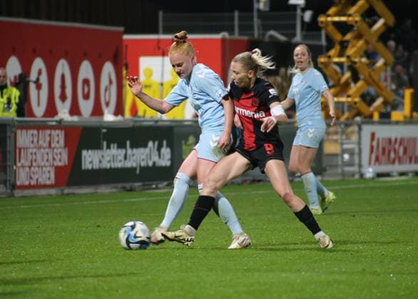 18 03 2024, xgrfx, Soccer 1 Bundesliga Women, Bayer Leverkusen 1 FC Köln emspor, v l Laura Vogt 1 FC Köln , Elisa Senß Bayer Leverkusen DFL DFB REGULATIONS PROHIBIT ANY USE OF PHOTOGRAPHS as IMAGE SEQUENCES and or QUASI VIDEO Leverkusen