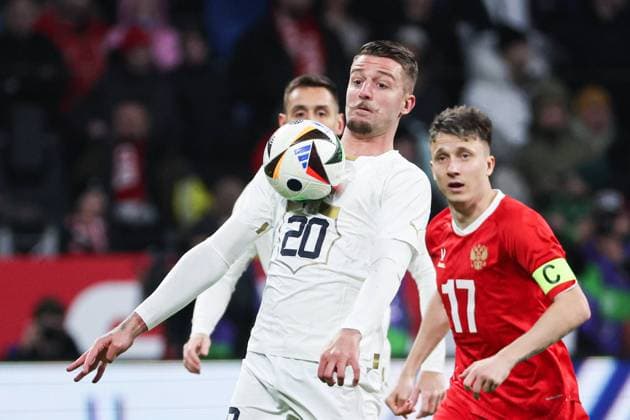 RUSSIA, MOSCOW - MARCH 21, 2024: Serbia s Sergej Milinkovic-Savic (front) and Russia s Alexander Golovin (R) are in action in their international football friendly match between Russia and Serbia at VTB Arena. Mikhail Tereshchenko TASS  68426340