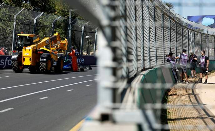 (240322) -- MELBOURNE, March 22, 2024 -- This photo taken on March 22, 2024 shows that the crashed car of Williams Alexander Albon is removed out of the track during the practice session of the Formula One Australia Grand Prix at Albert Park in Melbourne, Australia. ) (SP) AUSTRALIA-MELBOURNE-F1-GRAND PRIX 2024-PRACTICE MaxPing 