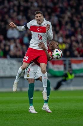 Mert Müldür of Turkey competes for the ball with Loic Nego of Hungary during the friendly match at Puskas ArÃ na on March 22, 2024 in Budapest, Hungary. Copyright: xRobertxSzaniszlox HUNTUR24 0401