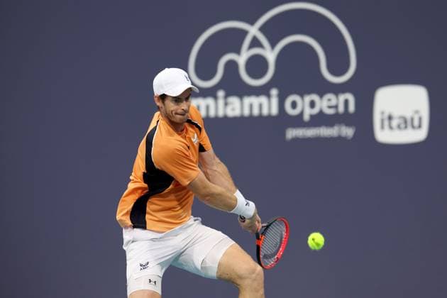 March 22, 2024, Miami Gardens, Florida, United States Of America: MIAMI GARDENS, FLORIDA - MARCH 22: Andy Murray of the United Kingdom hits a shot against TomoÂ¡s MartoÂ­n Etcheverry of Argentina during their match on day 7 of the Miami Open at Hard Rock Stadium on March 22, 2024 in Miami Gardens, Florida....People: Andy Murray Miami Gardens United States Of America - ZUMAs214 20240322_ada_s214_095 Copyright: xSMGx
