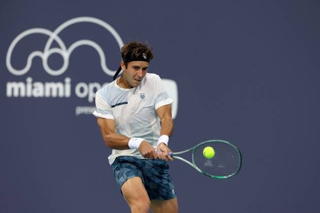March 22, 2024, Miami Gardens, Florida, United States Of America: MIAMI GARDENS, FLORIDA - MARCH 22: Andy Murray of the United Kingdom hits a shot against TomoÂ¡s MartoÂ­n Etcheverry of Argentina during their match on day 7 of the Miami Open at Hard Rock Stadium on March 22, 2024 in Miami Gardens, Florida....People: Tomas Martin Etcheverry Miami Gardens United States Of America - ZUMAs214 20240322_ada_s214_148 Copyright: xSMGx