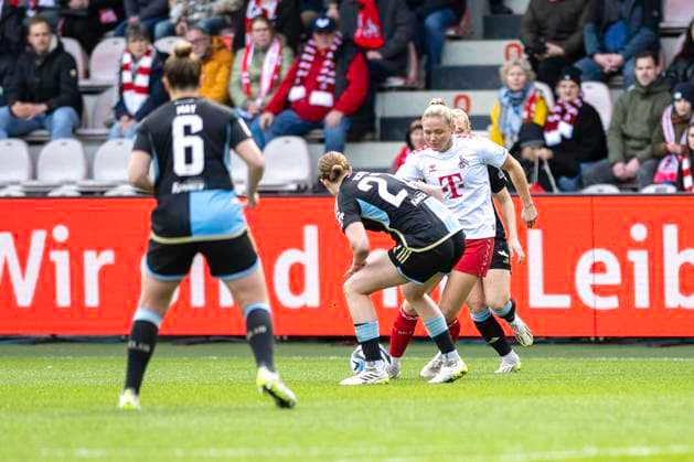 duel between Lara Schmidt 1 FC Nuernberg, 27 , in front and Marleen Schimmer 1 FC Koeln, 23 , behind Football Google Pixel Womens Bundesliga, Season 2023 2024, Matchday 16, 1 FC Koeln 1 FC Nuernberg on 23 03 2024 at Franz Kremer Stadium in Koeln Important notice According to the regulations of the DFL German Football League or the DFB German Football Association it is prohibited, to exploit or have exploited photographs taken in the stadium and or of the match in the form of sequential images and or video-like photo series Foto Kirchner Media TH Copyright: xKirchner-Media THx
