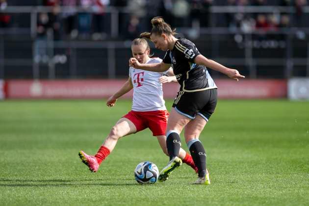 duel between Jessica May 1 FC Nuernberg, 06 , in front and Laura Donhauser 1 FC Köln, 25 , behind Football Google Pixel Womens Bundesliga, Season 2023 2024, Matchday 16, 1 FC Koeln 1 FC Nuernberg on 23 03 2024 at Franz Kremer Stadium in Koeln Important notice According to the regulations of the DFL German Football League or the DFB German Football Association it is prohibited, to exploit or have exploited photographs taken in the stadium and or of the match in the form of sequential images and or video-like photo series Foto Kirchner Media TH Copyright: xKirchner-Media THx