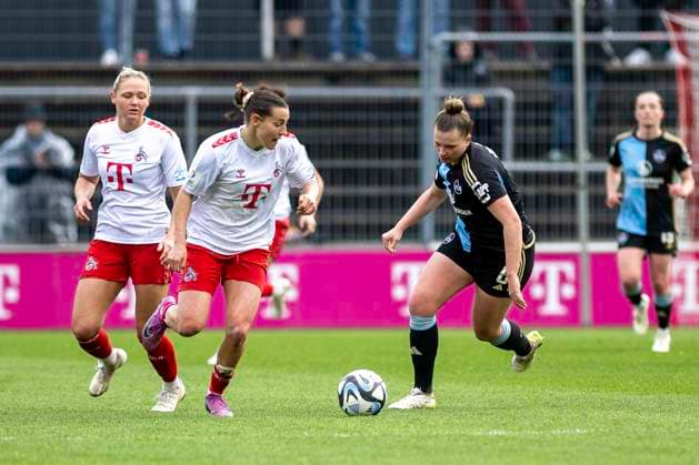 Duel between Carlotta Wamser 1 FC Koeln, 30 , left and Jessica May 1 FC Nuernberg, 06 , right Behind Marleen Schimmer 1 FC Koeln, 23 Soccer Google Pixel Womens Bundesliga, Season 2023 2024, Matchday 16, 1 FC Koeln 1 FC Nuernberg on 23 03 2024 at Franz Kremer Stadium in Koeln Important note According to the regulations of the DFL German Football League or the DFB German Football Association, it is prohibited to use or have used photographs taken in the stadium and or of the match in the form of sequential images and or video-like photo series Foto Kirchner Media TH Copyright: xKirchner-Media THx