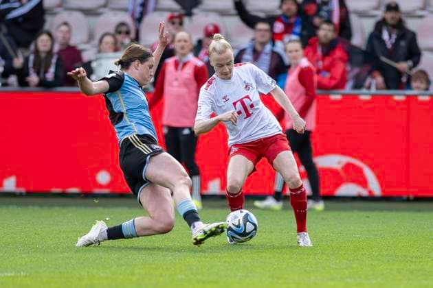 duel between Lara Schmidt 1 FC Nuernberg, 27 , in front and Anna Gerhardt 1 FC Koeln, 21 , behind Football Google Pixel Womens Bundesliga, Season 2023 2024, Matchday 16, 1 FC Koeln 1 FC Nuernberg on 23 03 2024 at Franz Kremer Stadium in Koeln Important notice According to the regulations of the DFL German Football League or the DFB German Football Association it is prohibited, to exploit or have exploited photographs taken in the stadium and or of the match in the form of sequential images and or video-like photo series Foto Kirchner Media TH Copyright: xKirchner-Media THx