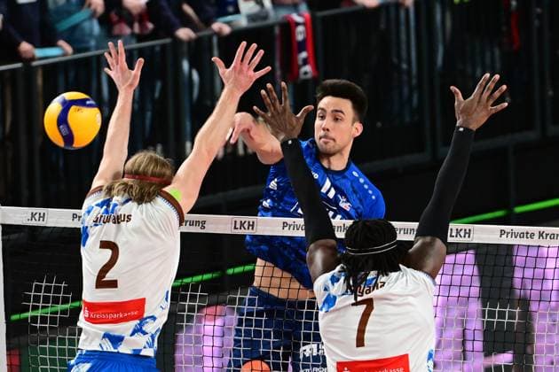 Volleyball I Men I 2023 2024 I Bundesliga I Playoffs I Quarterfinals I Match 2 I SVG Lüneburg WWK Volleys Herrsching I 23 3 2024 Xander Wolf Wassenaar Ketrzynski 11, SVG Lüneburg makes the point against the double block of Daniel Gruvaeus 2, WWK Volleys Herrsching and Magloire Mayaula Nzeza 7, WWK Volleys Herrsching Lüneburg LKH Arena Niedersachsen Germany Copyright: xLobeca AndreasxHannigx