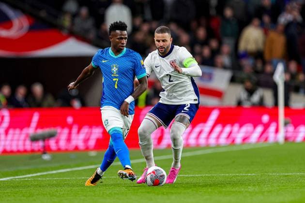 England v Brazil Friendly 23 03 2024. Kyle Walker (2) of England battles with Vinicius Junior of Brazil during the Friendly match between England and Brazil at Wembley Stadium, London, England on 23 March 2024. Editorial use only , Copyright: xNigelxKeenex PSI-19285-0005
