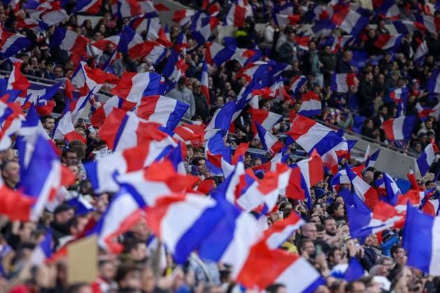 Soccer international match France Germany on 23 03 2024 at Groupama Stadium in Lyon Fans of the French national team waving flags before the match DFB regulations prohibit any use of photographs as image sequences and or quasi video xMSx
