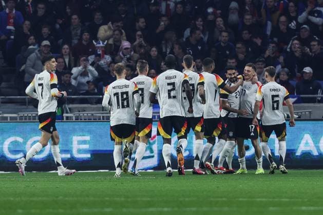 Sport, Football, UEFA international match season 2023 24 friendly match France Germany 23 03 2024, Groupama Stadium Lyon Goal celebration Germany after the goal to 0 1 by Toni Kroos Germany, 8 the players are happy Lyon Groupama Stadium France