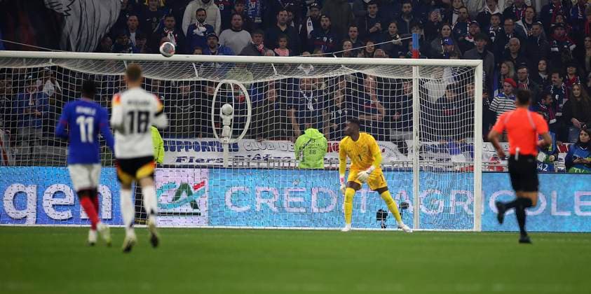 23 03 2024, Football national teams friendlies 2024, France Germany, at Groupama Stadium Lyon, France Goalkeeper Brice Samba France cant follow the ball to Florian Wirtzs goal, Germany can only look after it