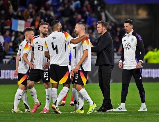 23 03 2024, Football national teams friendlies 2024, France Germany, at Groupama Stadium Lyon, France Good mood after the match with from left Josua Kimmich Germany , Jonathan Tah Germany , Chris Jan Führich Germany , Waldemar Anton Germany , coach Julian Nagelsmann Germany , co-coach Sandro Wagner Germany