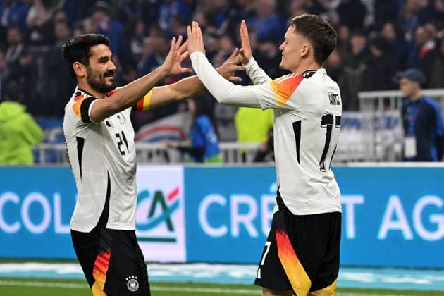 Lyon, Groupama Stadium, 23 03 24, GER, Men, Laenderspiel, France Germany Picture Florian WIRTZ Germany celebrates after his goal to 0 1 with Ilkay GUENDOGAN Germany Only for editorial use UEFA regulations prohibit any use of photographs as image sequences and or quasi video Auvergne Rhone Alpes France