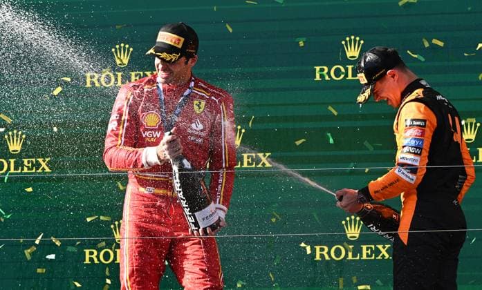 AUSTRALIAN F1 GRAND PRIX, Carlos Sainz of Spain (left) and Lando Norris of Britain celebrate following the Australian Grand Prix 2024 at Albert Park Circuit in Melbourne, Sunday, March 24, 2024. ( NO ARCHIVING, EDITORIAL USE ONLY, NO USE IN BOOKS WITHOUT CONSENT MELBOURNE VICTORIA AUSTRALIA  Copyright: xJOELxCARRETTx 20240324001921962300