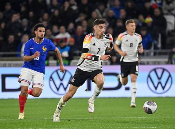 Friendly match France vs Germany 23 03 2024, Groupama Stadium, Lyon, Friendly match France vs Germany , in the picture France s defender Warren Zaire Emery , Germany s midfielder Kai Havertz nordphotoxGmbHx xBratic nph00250