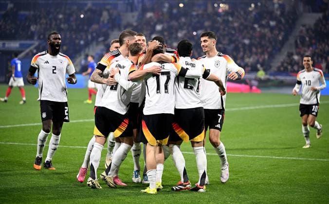 FOOTBALL INTERNATIONAL Test match in Lyon France Germany 23 03 2023 Cheers, a bunch of cheers after the goal to 0 1 by goal scorer Florian Wirtz Germany in the middle Toni Kroos Germany