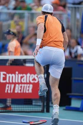 March 24, 2024, Miami, Florida, USA: Andy Murray hobbles after injuring his ankle late in the third set against Tomas Machac (Czech Republic) during the third round of menÃ¢â‚¬â ¢s singles at the Miami Open tennis tournament. Machac won the match 5-7,7-5, 7-6. Miami USA - ZUMAd212 20240324_zsp_d212_074 Copyright: xRichardxDolex