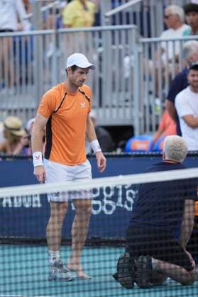 March 24, 2024, Miami, Florida, USA: Andy Murray takes a medical time out after injuring his ankle late in the third set against Tomas Machac (Czech Republic) during the third round of menÃ¢â‚¬â ¢s singles at the Miami Open tennis tournament. Machac won the match 5-7,7-5, 7-6. Miami USA - ZUMAd212 20240324_zsp_d212_080 Copyright: xRichardxDolex