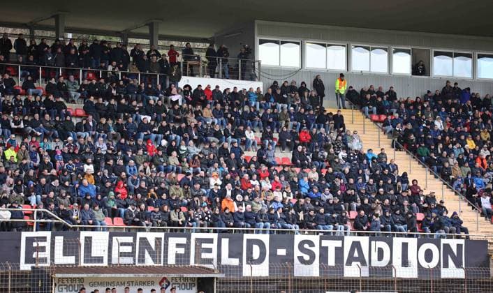 23 03 2024, Soccer, Men, Sparkassen Pokal Saarland, Round of 16, Season 2023 2024, VfB Borussia Neunkirchen 1 FC Saarbrücken, Spectators watch from the stands the cup match between Borussia Neunkirchen and 1 FC Saarbrücken on March 23, 2024, Ellenfeldstadion, lettering Neunkirchen Ellenfeldstadion Saarland Germany EN