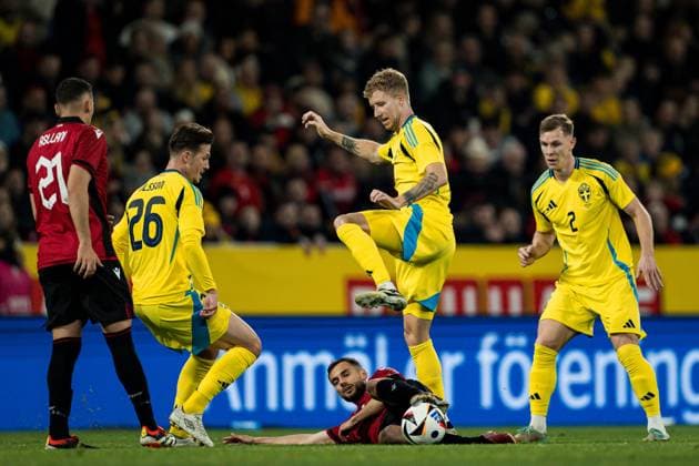 240325 Simon Olsson, Samuel Gustafson and Emil Krafth of Sweden against Nedim Bajrami of Albania during the international friendly football match between Sweden and Albania on March 25, 2024 in Stockholm Photo Joel Marklund BILDBYRAN code JM JM0569 bbeng fotboll football soccer fotball träningslandskamp träningsmatch international friendly landskamp sverige sweden sverige a albanien albania  Copyright: JOELxMARKLUND BB240325JM072