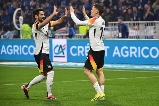 Lyon, Groupama Stadium, 23 03 24, GER, Men, Laenderspiel, France Germany Picture Florian WIRTZ Germany celebrates after his goal to 0 1 with Ilkay GUENDOGAN Germany Only for editorial use UEFA regulations prohibit any use of photographs as image sequences and or quasi video Auvergne Rhone Alpes France