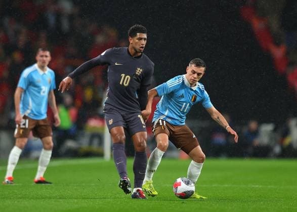 26th March 2024; Wembley Stadium, London, England; International Football Friendly, England versus Belgium; Jude Bellingham of England closely marked by Leandro Trossard of Belgium  ActionPlus12621856 JohnxPatrickxFletcher