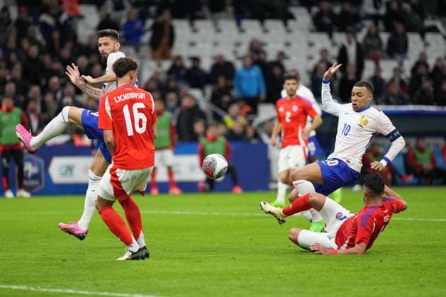 Kylian Mbappe of France is tackled by Mauricio Isla of Chile France v Chile, International Friendly, Länderspiel, Nationalmannschaft Football, Stade Velodrome, Marseille, France - 26 Mar 2024 EDITORIAL USE ONLY No use with unauthorised audio, video, data, fixture lists, club league logos or live services. Online in-match use limited to 120 images, no video emulation. No use in betting, games or single club league player publications.  Copyright: xDavexWinter Shutterstockx 14400428az