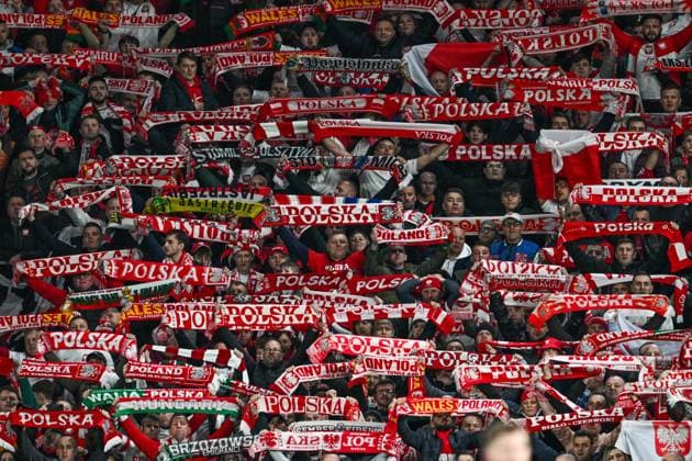UEFA EURO, EM, Europameisterschaft,Fussball Qualifiers Play-Off Eliminator Group A Wales v Poland Polish fans hold their flags aloft during the UEFA Euro Qualifiers Eliminator Group A match Wales vs Poland at Cardiff City Stadium, Cardiff, United Kingdom, 26th March 2024 (Photo by Craig Thomas News Images) Cardiff Cardiff City Stadium South Glamorgan United Kingdom Copyright: xCraigxThomas NewsxImagesx