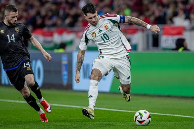 Dominik Szoboszlai of Hungary competes for the ball with Valon Berisha of Kosovo during the friendly match at Puskas ArÃ na on March 26, 2024 in Budapest, Hungary. Copyright: xRobertxSzaniszlox HUNKOS24 0131