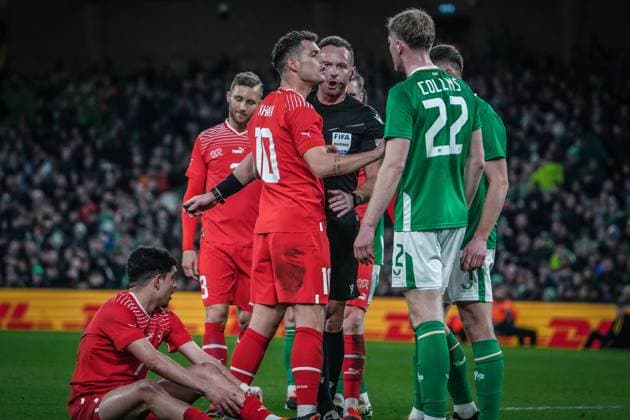 International Friendly, international match, national team Aviva Stadium, Dublin 26 3 2024 Republic of Ireland vs Switzerland Swiss Granit Xhaka with referee PaweÅ Raczkowski POL and Irelands Nathan Collins Dublin Aviva Stadium Ireland Copyright: xJoeranxSteinsiekx
