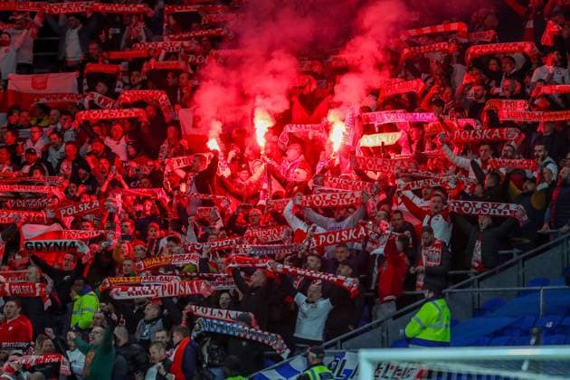 26th March 2024; Cardiff City Stadium, Cardiff, Wales; UEFA EURO, EM, Europameisterschaft,Fussball Qualifying, EM, Europameisterschaft Play Off Football, Wales versus Poland; Polish fans light flares during the singing of the anthem  ActionPlus12622161 WelshxImages