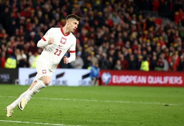 Cardiff, Wales, 26th March 2024. Krzysztof Piatek of Poland celebrates scoring a penalty during a shoot out to decide the UEFA European Championship, EM, Europameisterschaft Qualifying match at the Cardiff City Stadium, Cardiff. Picture credit should read: Darren Staples Sportimage EDITORIAL USE ONLY. No use with unauthorised audio, video, data, fixture lists, club league logos or live services. Online in-match use limited to 120 images, no video emulation. No use in betting, games or single club league player publications. SPI-3041-0138