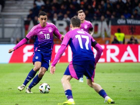 Jamal Musiala Germany, 10 on the ball, in front Florian Wirtz Germany, 17 , behind Toni Kroos Germany, 08 , GER, Germany vs Netherlands, DFB Football National Team Men, Laenderspiel, Saison 2023 2024, 26 03 2024 DFB regulations prohibit any use of photographs as image sequences and or quasi video GER, Germany vs Netherlands, DFB Football National Team Men, Laenderspiel, Saison 2023 2024, 26 03 2024 Frankfurt am Main Copyright: xEibner-Pressefoto Memmlerx EP_MMR